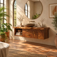 Floating vanity with live edge top, open cubby, two drawers and a door in a bright bathroom with arched windows and plants
