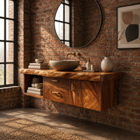 Floating vanity with live edge top, open cubby, two drawers and a door in an industrial loft bathroom with exposed brick