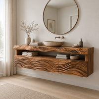 Wall hung cabinet with live edge top, open shelf and wave carved front in a Scandinavian bathroom with white walls