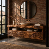 Wall hung cabinet with live edge top, open shelf and wave carved front in an industrial loft bathroom with exposed brick