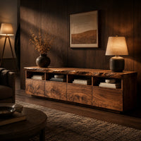 Live edge tv stand with four open cubbies above swirling grain front panels in an evening living room with walnut wall paneling