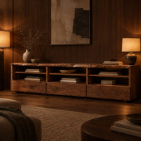 Live edge tv stand with three open shelf bays and lower front panels in an evening living room with walnut wall paneling