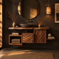 Floating bathroom vanity cabinet with a live edge top and wave carved fronts in a dark bathroom at golden hour
