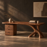 Desk with a long soft cornered top, three drawer block and branch leg, three-quarter view showing the grain