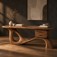 Desk with an oval top, a looped sculpted base and a two drawer box, three-quarter view showing the grain