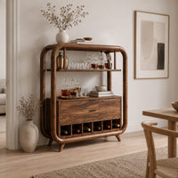 Bar cabinet with a looped wood frame, open shelf and slotted base in a Scandinavian dining room with white walls