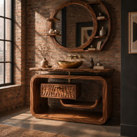 Vanity cabinet in a looped wood frame with a carved wave drawer front in an industrial loft bathroom with exposed brick