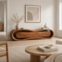 Loop framed tv stand with a ripple carved four panel front in a Scandinavian living room with white walls