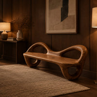 Bench with a flat plank seat, looped arms and ring shaped legs in an evening entryway with walnut wall paneling