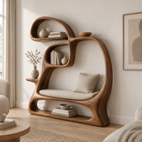 Looping bookshelf with open shelves and a cushioned seat bay in a Scandinavian living room with white walls