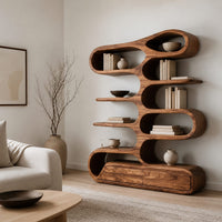 Tall bookshelf of stacked looping shelves on a solid base in a Scandinavian living room with white walls