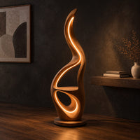Flame shaped floor lamp with glowing loops and a small flat ledge, three-quarter view showing the grain
