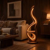 Flame shaped floor lamp with glowing loops and a small flat ledge in an evening living room with walnut wall paneling