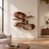 Wall shelf shaped as one looping ribbon of wood with open tiers in a bright open plan living room