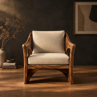 Lounge chair with oval side cutouts and an arched wooden base in a dark studio against a charcoal plaster wall