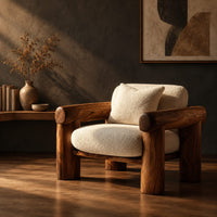 Lounge chair with thick log style arms, post legs and cream cushions, three-quarter view showing the grain