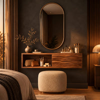 Floating makeup vanity with an open cubby and a wave carved front panel in a dark bedroom at golden hour