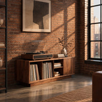 Low wood record console with three open cubbies and a panel end in an industrial loft living room with exposed brick