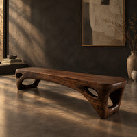 Low slab top bench with open triangular legs, three-quarter view showing the grain