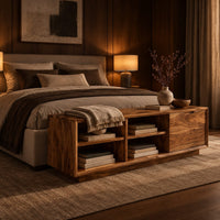 Low storage bench with four open cubbies and a closed wood panel in an evening bedroom with walnut wall paneling