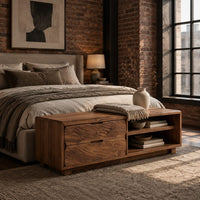 Low bench with two drawers, an open shelf cubby and a seat pad in an industrial loft bedroom with exposed brick