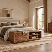 Low bench with two drawers, an open shelf cubby and a seat pad in a bright open plan bedroom