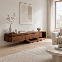 Low tv stand with a three panel front and a sweeping curved loop base in a Scandinavian living room with white walls