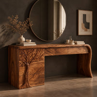 Corner detail of makeup vanity with a carved tree pedestal and a sweeping slab leg beside wood, brass and linen samples