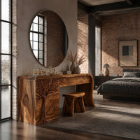 Makeup vanity with a carved tree pedestal and a sweeping slab leg in an industrial loft bedroom with exposed brick