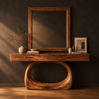 Makeup vanity with a wide top and an open oval loop base in a dark studio against a charcoal plaster wall