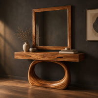 Makeup vanity with a wide top and an open oval loop base, three-quarter view showing the grain