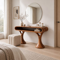 Makeup vanity with a pill shaped open shelf top and flared pedestal legs in a Scandinavian bedroom with white walls