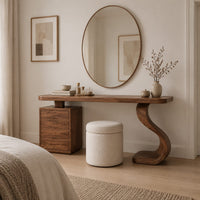 Makeup vanity with an s curve pedestal and a three drawer cabinet in a Scandinavian bedroom with white walls