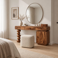 Makeup vanity with three drawers a stacked bead leg and a side cabinet in a Scandinavian bedroom with white walls