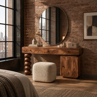 Makeup vanity with three drawers a stacked bead leg and a side cabinet in an industrial loft bedroom with exposed brick