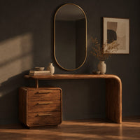 Makeup vanity with a waterfall end and a three drawer cabinet, three-quarter view showing the grain