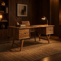 Mid century writing desk with two drawers and splayed legs in an evening home office with walnut wall paneling
