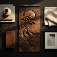 Detail of dark wooden wall relief of a moon over waves beside wood, brass and linen samples