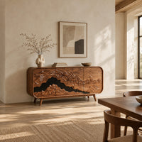 Mountain relief carved sideboard with a dark band and tapered legs in a bright open plan dining room