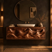 Floating bathroom vanity with carved mountain ridge doors in a dark bathroom at golden hour