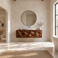 Floating bathroom vanity with carved mountain ridge doors in a bright open plan bathroom