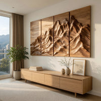 Four panel carved mountain wall art set above a light oak sideboard in daylight