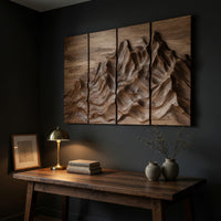 Four panel carved mountain wall art set above a desk in a dark study corner