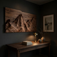 Mountain wall panel with a natural top edge above a desk in a dark study corner