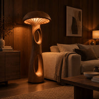 Mushroom floor lamp with a domed cap and tall carved stem in an evening living room with walnut wall paneling