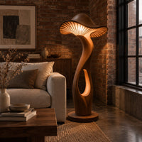 Mushroom shaped floor lamp with a ribbed cap and a glowing oval cutout in an industrial loft living room with exposed brick