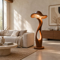 Mushroom shaped floor lamp with a ribbed cap and a glowing oval cutout in a bright open plan living room