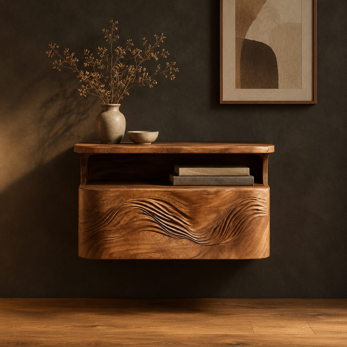 Floating nightstand with a carved wave front and an open nook under the top in a dark studio against a charcoal plaster wall
