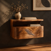 Floating nightstand with a carved wave front and an open nook under the top, three-quarter view showing the grain