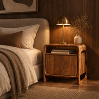 Nightstand with an open top cubby and a looped side frame in an evening bedroom with walnut wall paneling